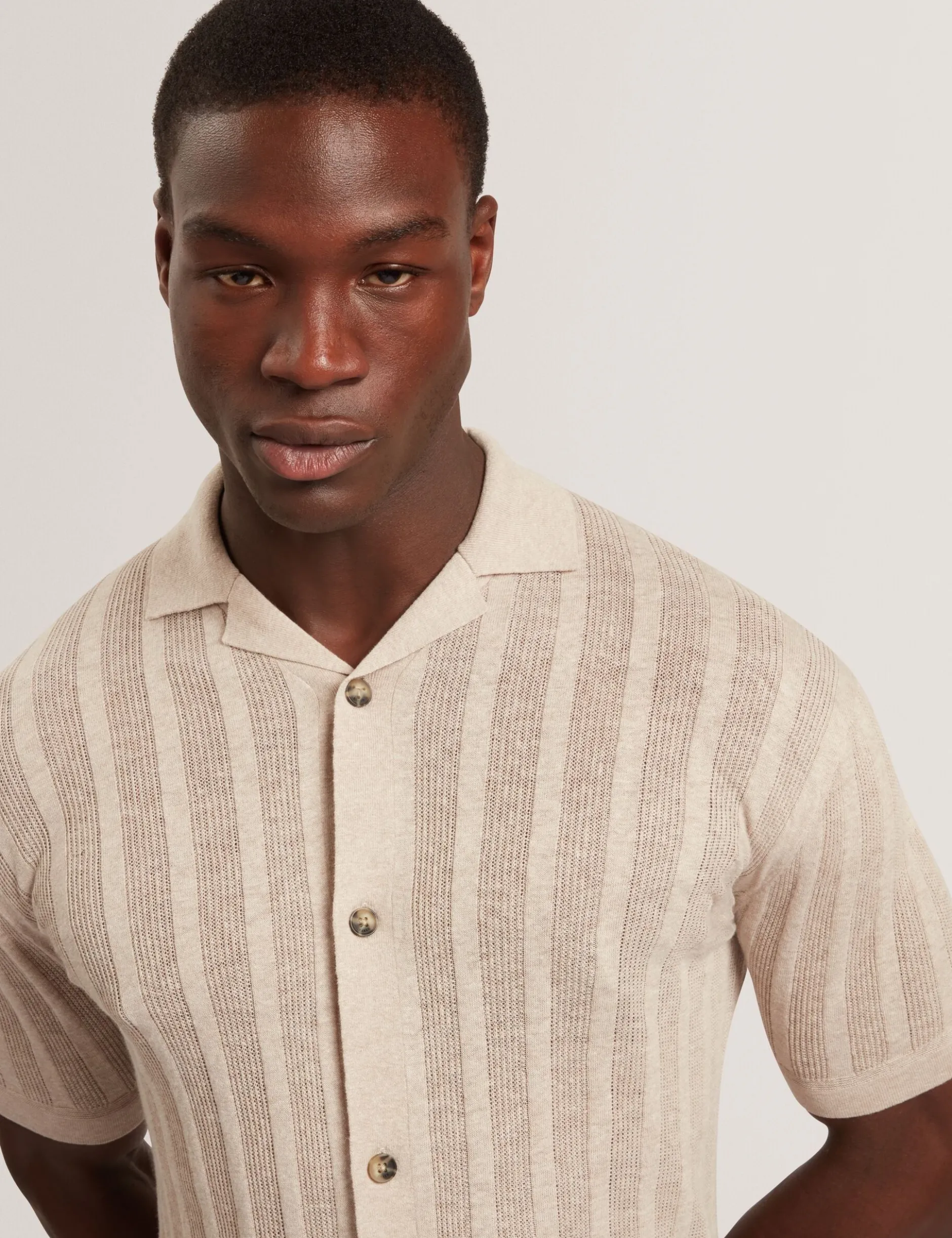 Stitched Stripe Knit Button-Through Polo